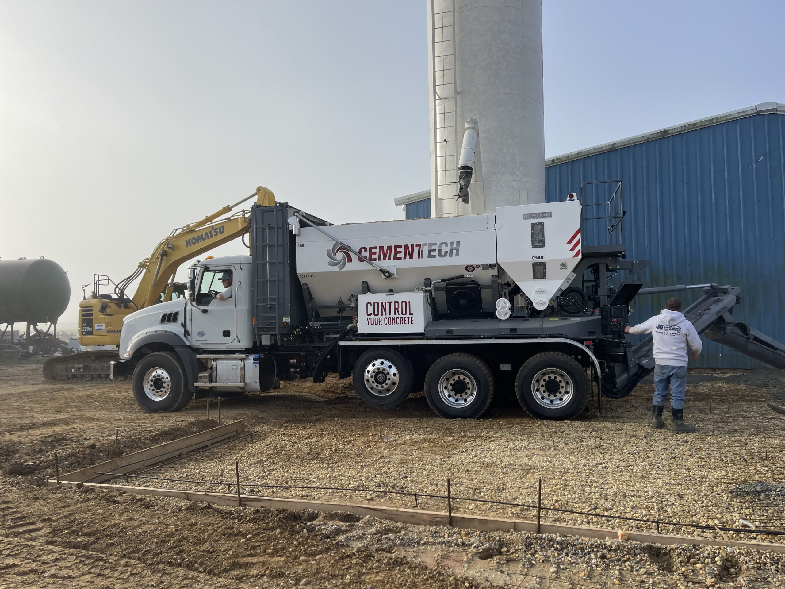 Cement Techs MD LLC Truck pouring concrete