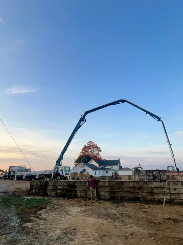 Boom in action at a jobsite with concrete pumping services for Cement Techs MD